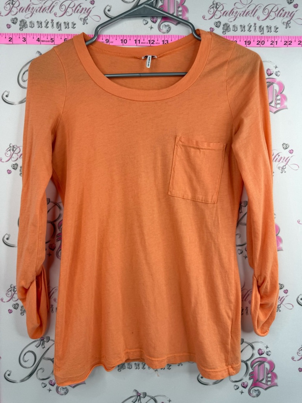 Splendid Long Sleeve Pocket Tee Coral-Orange with a single chest pocket, casual